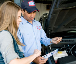 Customer Talking to AAMCO Mechanic - Transmission Repair - AAMCO Colorado
