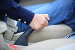 Image - hand on emergency brake.