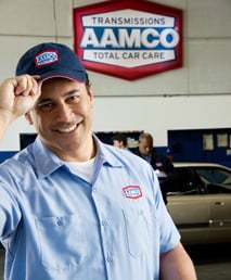 Smiling AAMCO Expert Technician