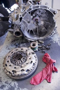image of a transmission torque converter in pieces during repair.