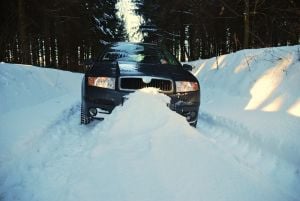 image of a car stuck in the snow