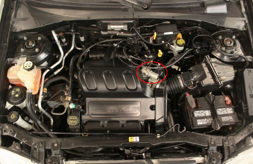 image vehicle under the hood showing radiator and other car components